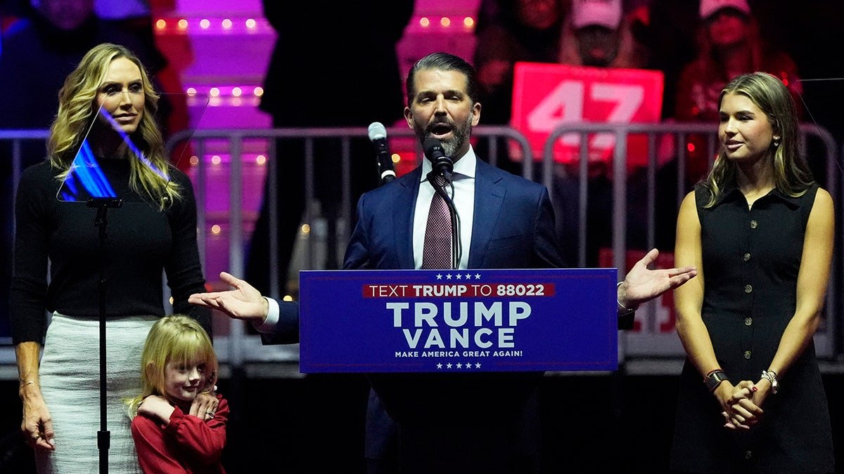 Donald Trump Junior speaks during a march about US President -elect Donald Trump