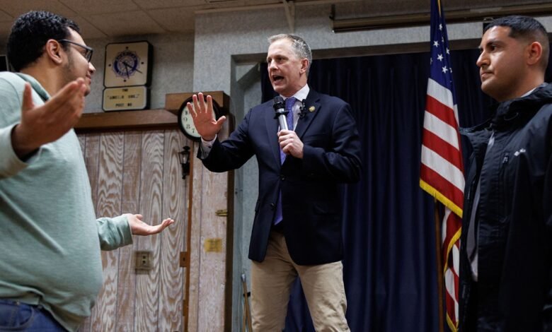 1742590323 Protesters disrupt jump on stage during Democrat congressmans town hall.jpg