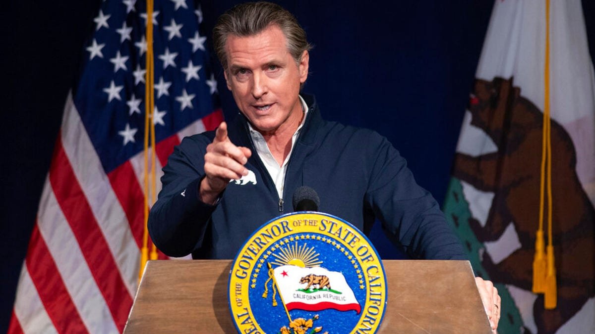 California Governor Gavin New Roosome on the podium