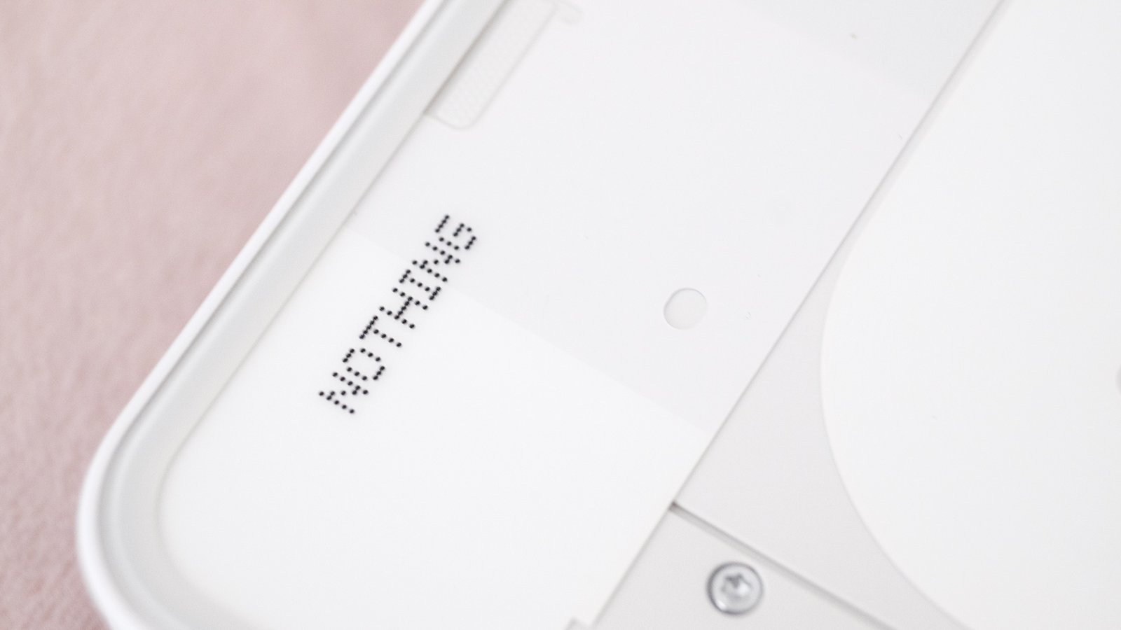 A closeup of the Nothing Phone 3a's logo. 