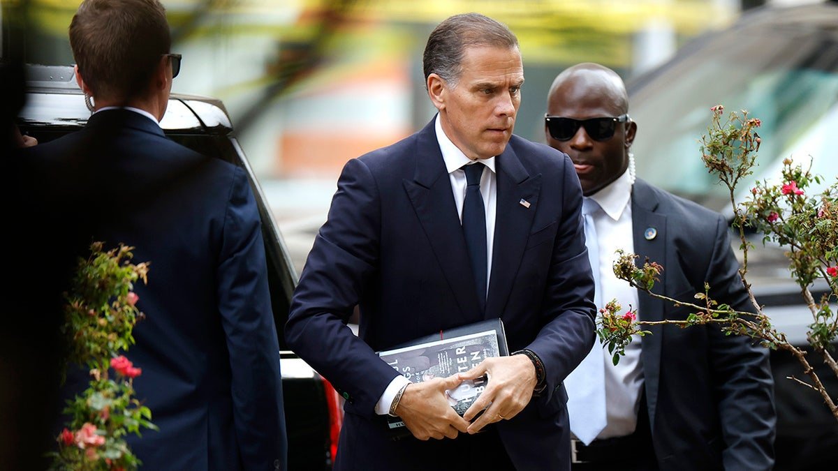 Hunter Biden and Melissa Cohen Biden arrive at the Federal Court