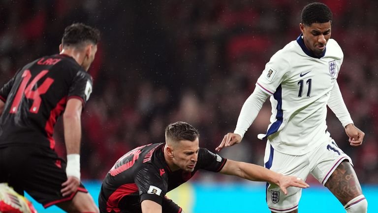Marcus Rashford runs with the ball in the World Cup qualifiers in England against Albania