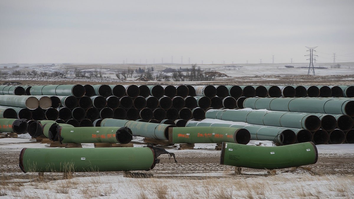 Keystone XL pipeline is stacked in a square near Owen, Alberta, Canada, on Tuesday, January 26, 2021. 