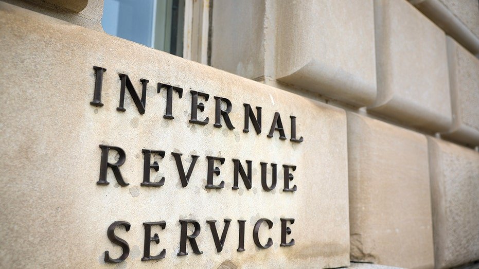 Tax Authority sign on the side of the building