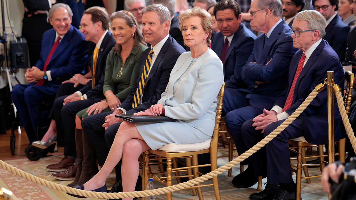 Linda McMahon with others at a signing ceremony in the eastern room of the White House