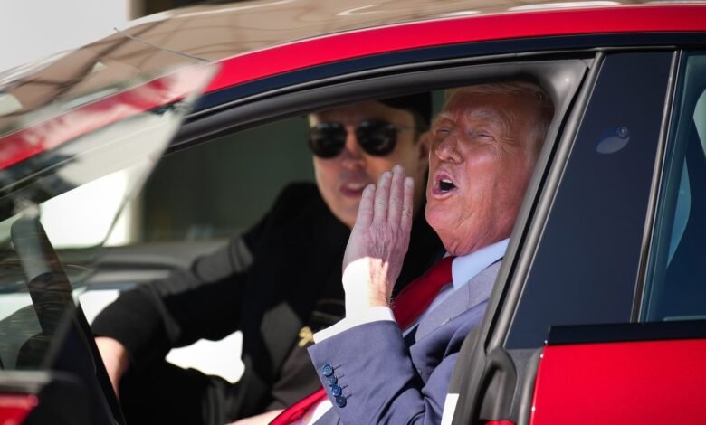 Elon Musk and Donald Trump in a Tesla.jpg