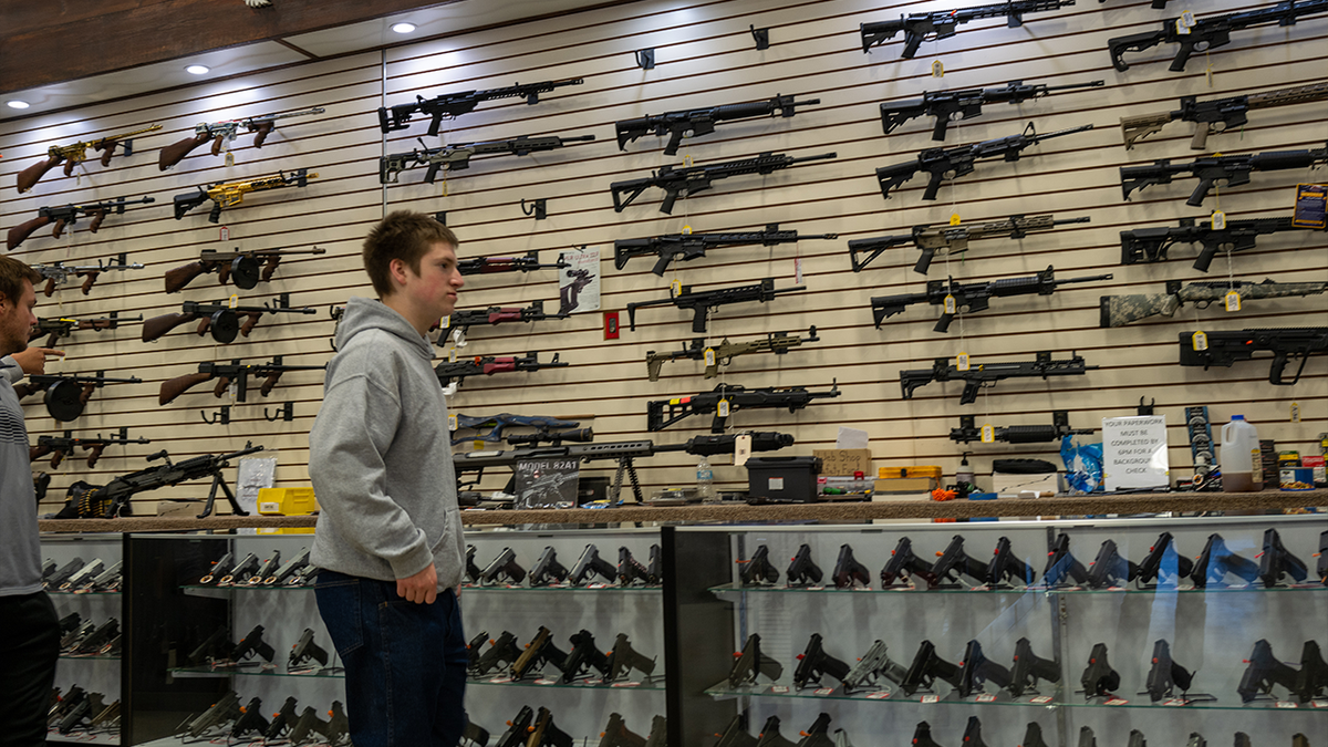 A young man in the weapons store in Pennsylvania