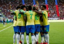 brazil s raphinha celebrates scoring their first goal with teammates.JPG