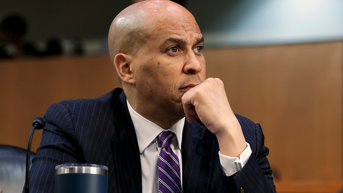 Senator Cori -Booker listens as a candidate for the United States Supreme Court, Kitanji Brown Jackson, during her confirmation session before the Senate Judicial Committee on March 22, 2022 in Washington.