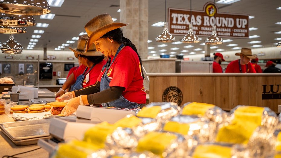 Employees prepare Bucate offers inside BUC-Ee in Lulling, Texas.