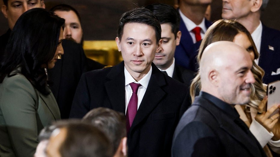Shu Zeu (C), CEO of Tiktok, arrives at the inauguration of Donald Trump as an American president coming in Rotonda, Capitol, Washington, DC, on January 20, 2025.