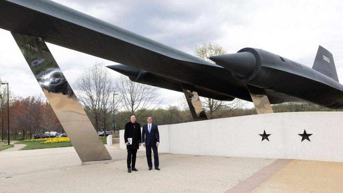 Ratcliffe and musk on the campus of the CIA