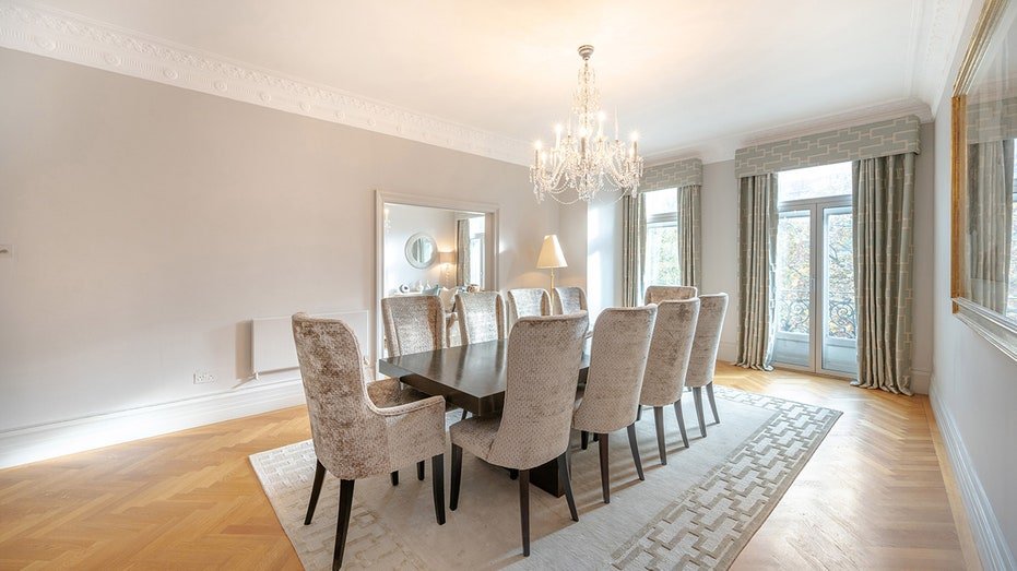 The dining room features a large table enough for ten guests.