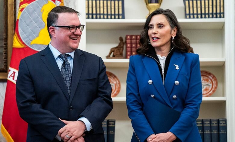 1744553502 Whitmer shields face with folder during Trump Oval Office meeting.jpg