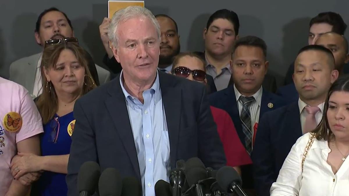 Senator Chris van Holin, DMD.