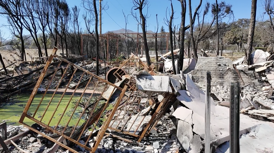 Cuts of rubble and a green pool of forest fires