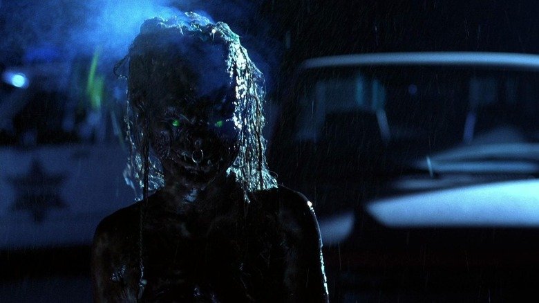 A devil stands outside the house in the rain in tales from a basement: a demon of Faris