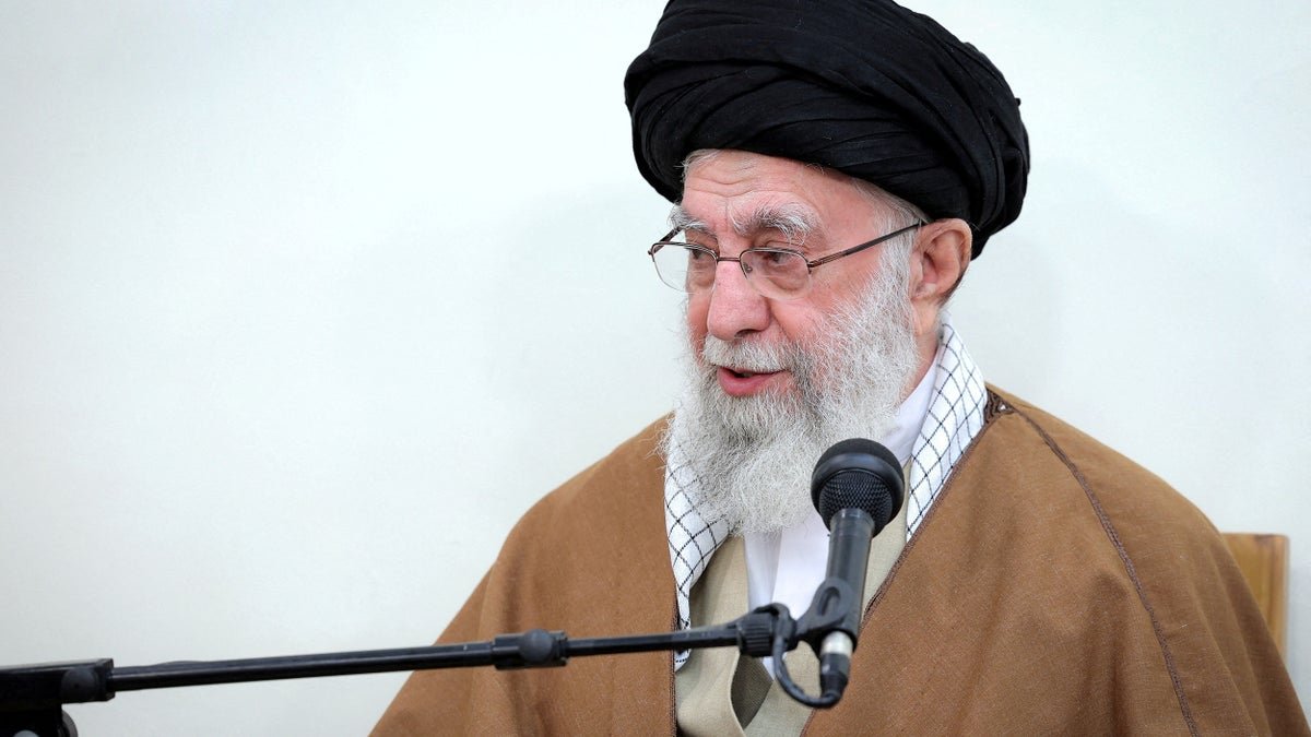 Iran's supreme leader, Ayatollah Ali Khamanini, speaks during a meeting with <a href=
