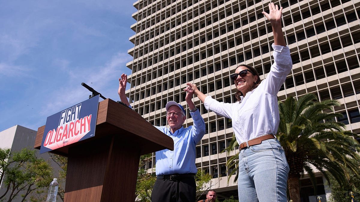 Bernie Sanders and AOC on the stage
