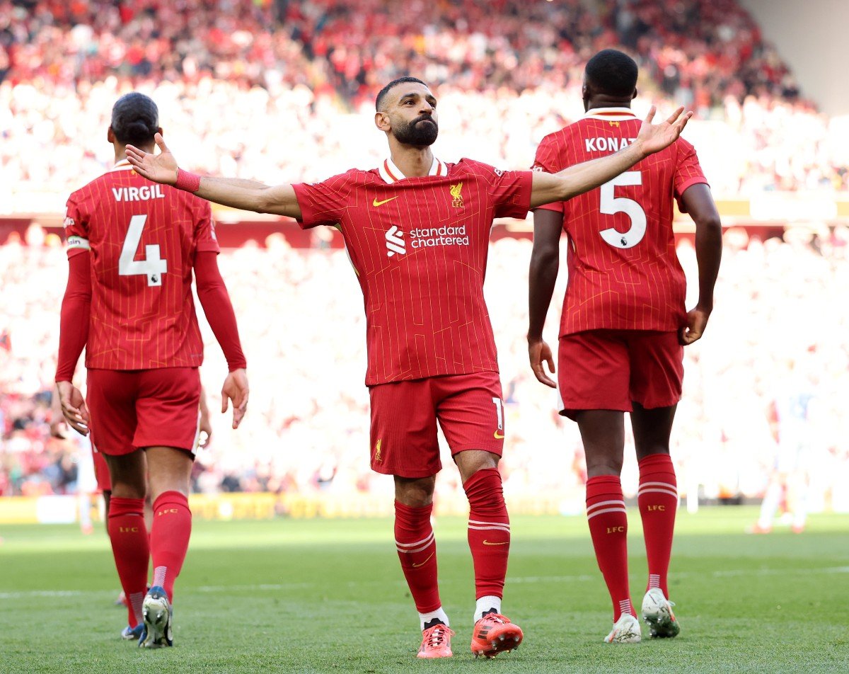 Mohamed Salah celebrates his registration, as Liverpool beat Tottenham 5-1 in Anfield