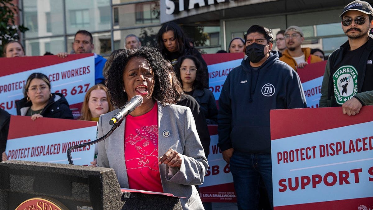 Lola Smallwood-Cuevas speaks at an event