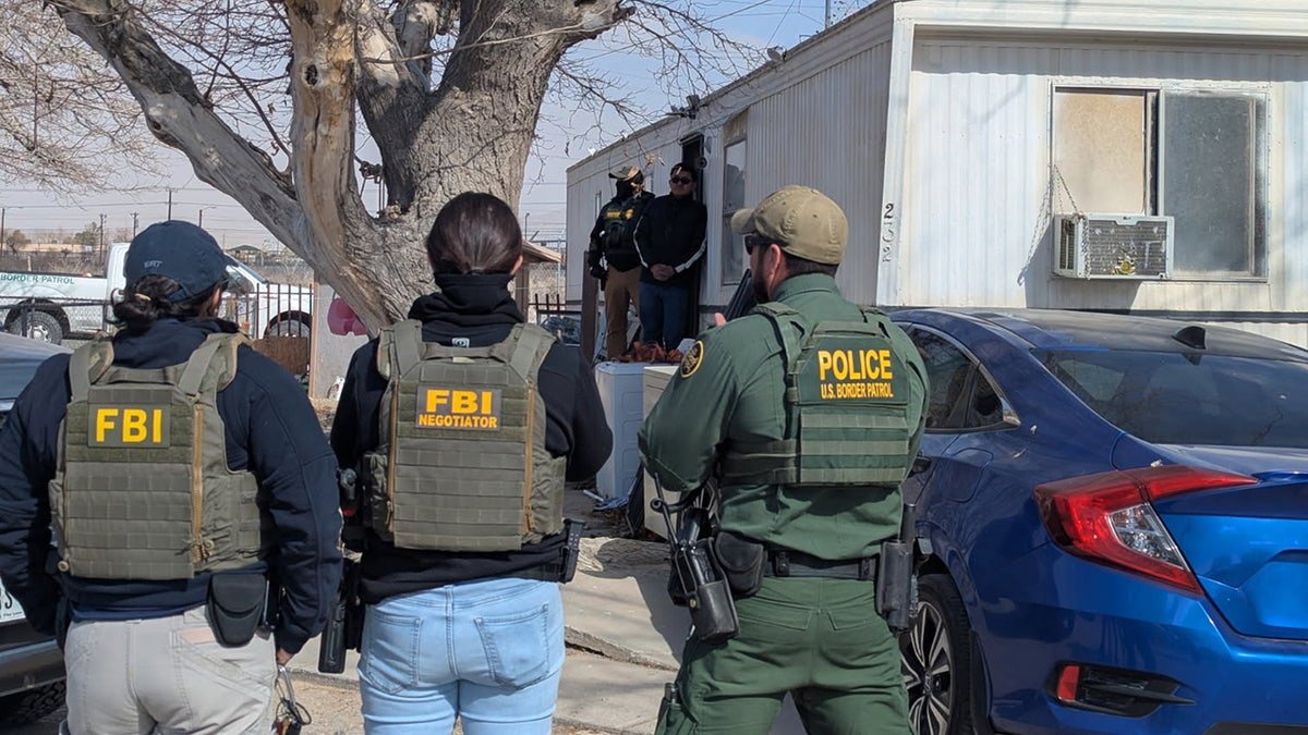 Officers from Internal Security and Federal Investigation Office run the enforcement of immigration in El Passo, Texas