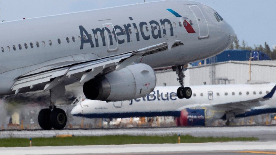 US Airlines and Jetblue plane on the runway