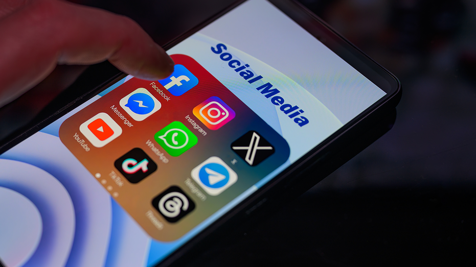 The Facebook logo is displayed on a smartphone among other social networks in this illustration in Brussels, Belgium, on January 22, 2024.