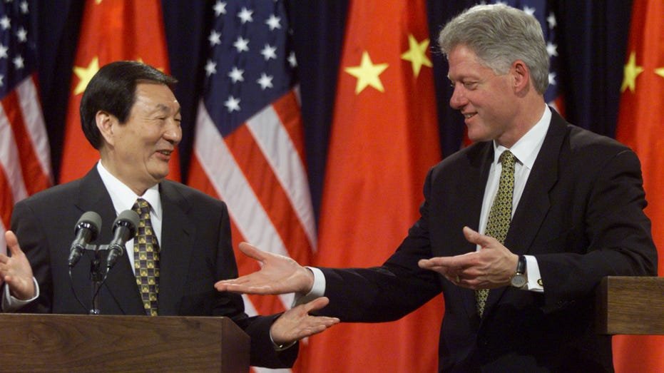 President Bill Clinton and Chinese Prime Minister Zhu Rongji conclude their press conference at the White House April 8, 1999