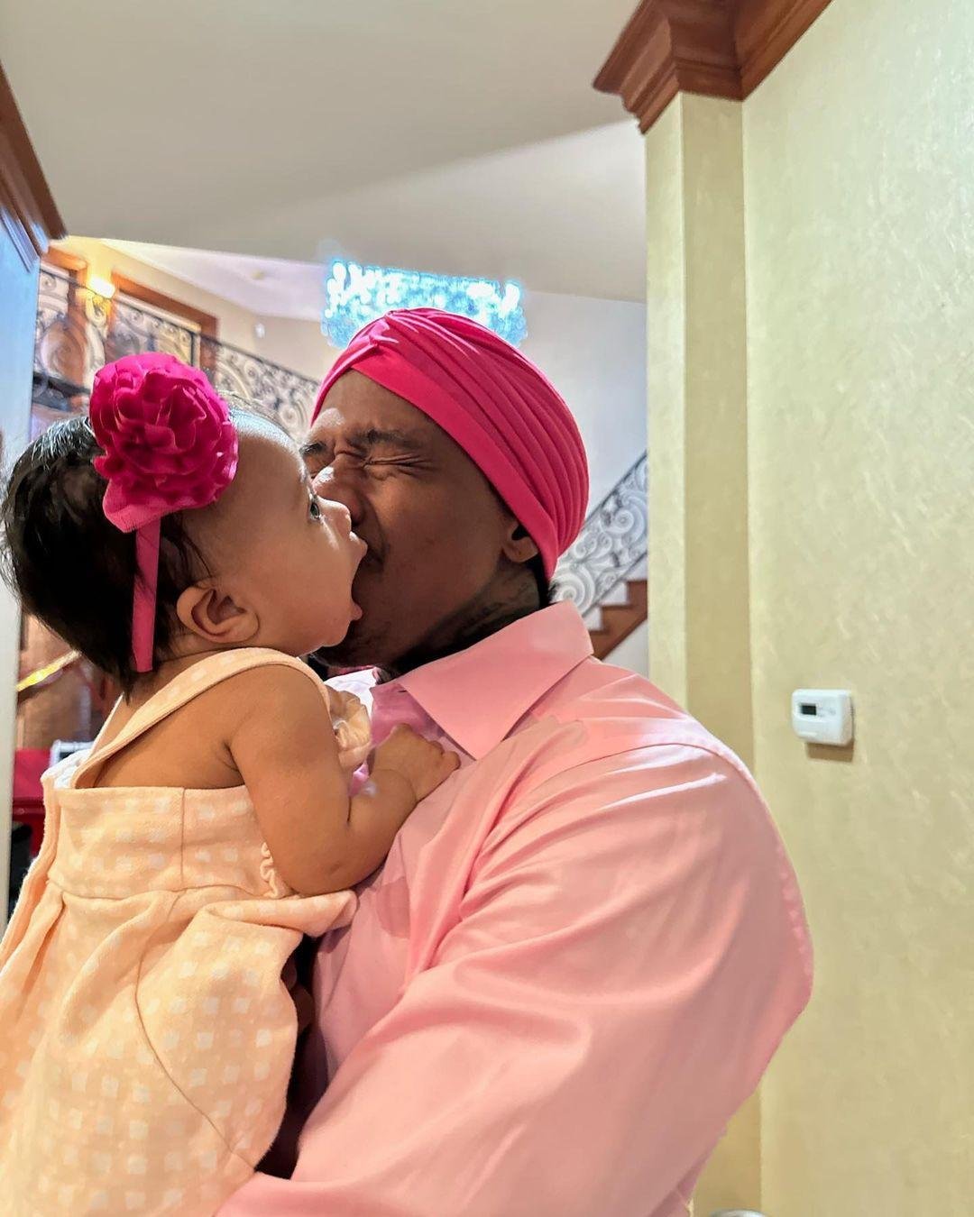 Nick Canon Bonds with Halo's daughter in matching pink clothes