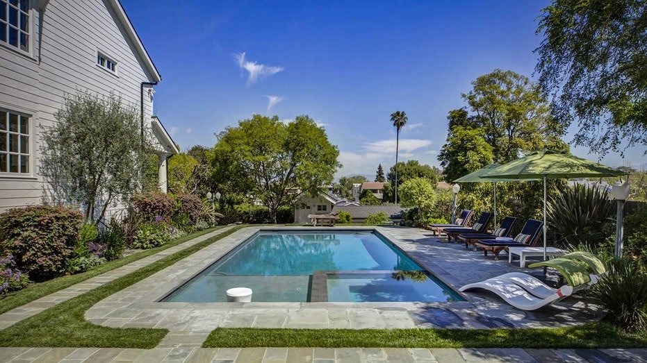 The courtyard also includes a swimming pool.