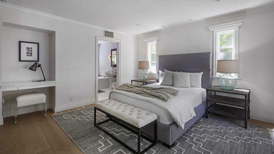 The main level includes the AA Guest suite with its own balcony and an internal bathroom.