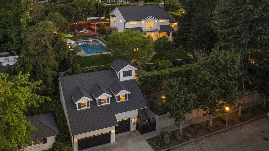 From the streets, guests will find a three -car garage and a group of stairs that lead to the main home.
