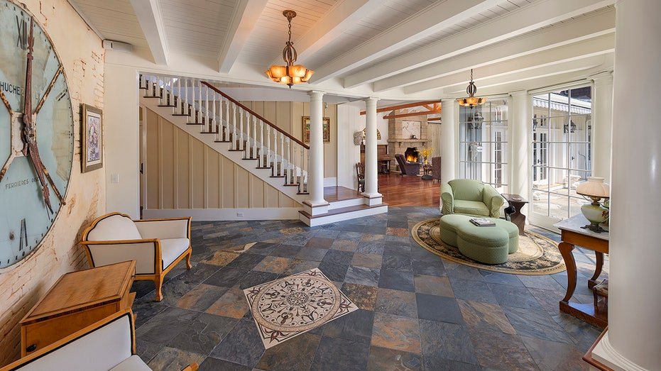The oriental wing is characterized by black floors of tiles and windows extending from floor to ceiling.