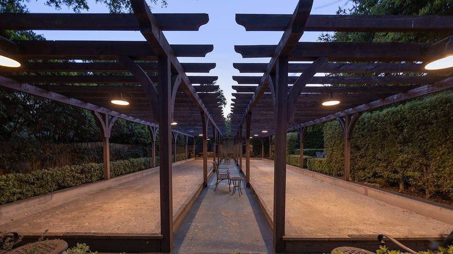 The rear courtyard also includes Bocce.