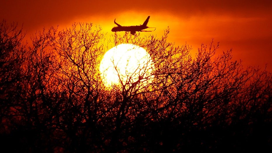 A plane against the Newark horizon