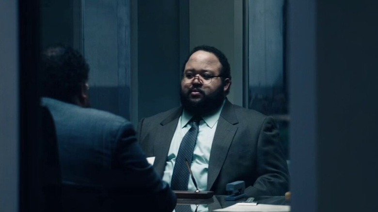 Dylan goes to have a work interview at the door in Severance