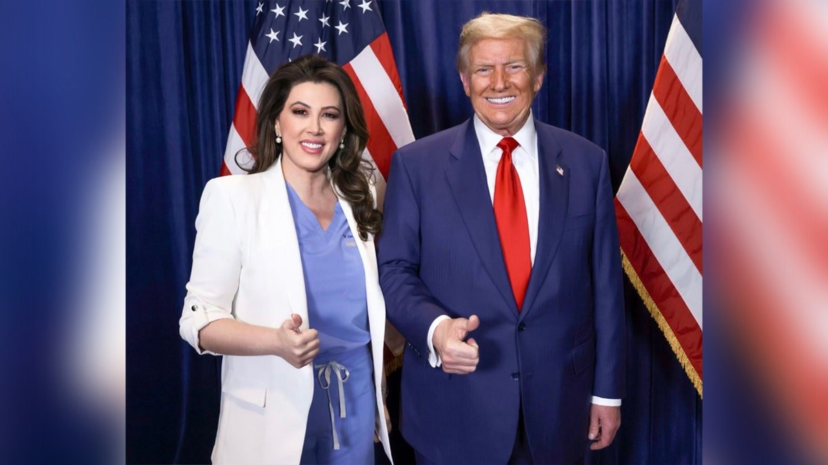 A picture of President Trump and Dr. Janet Nishawat.
