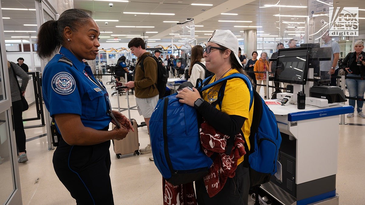 Young travelers present a real identifier at the airport on the first day of the applicable program