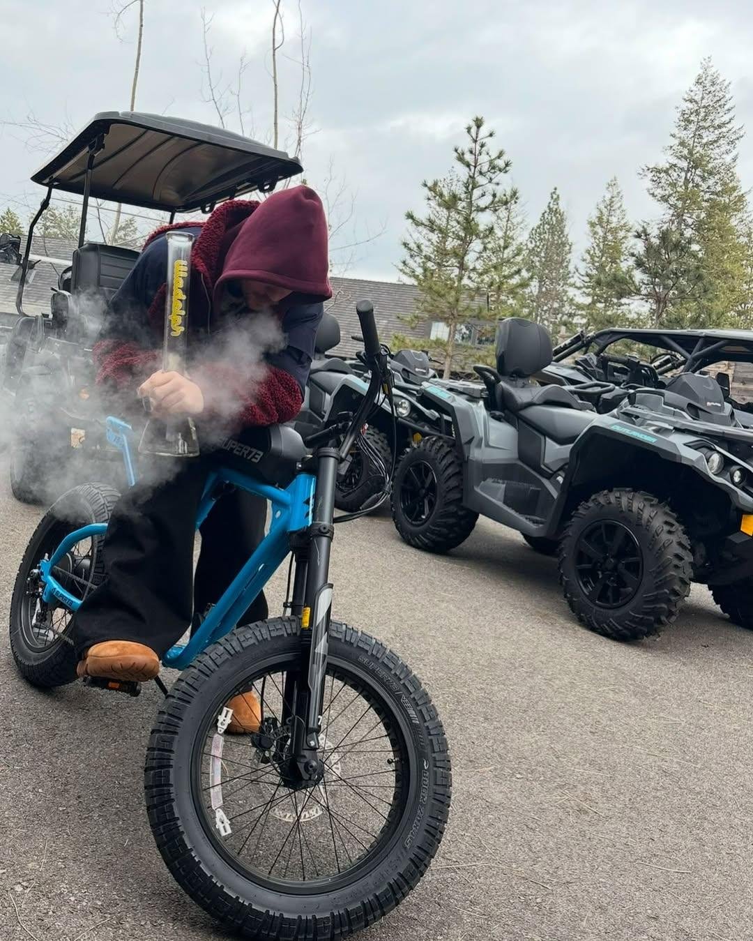 Justin Bieber smokes Bong on a bike in new photos
