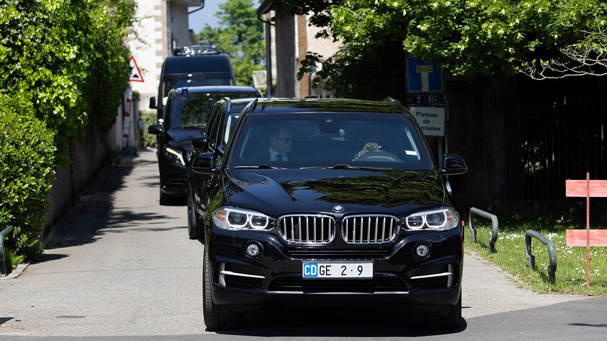 A car with the US Treasury Secretary Bessent leaves a stay where commercial talks occur between Chinese and American delegations in Geneva