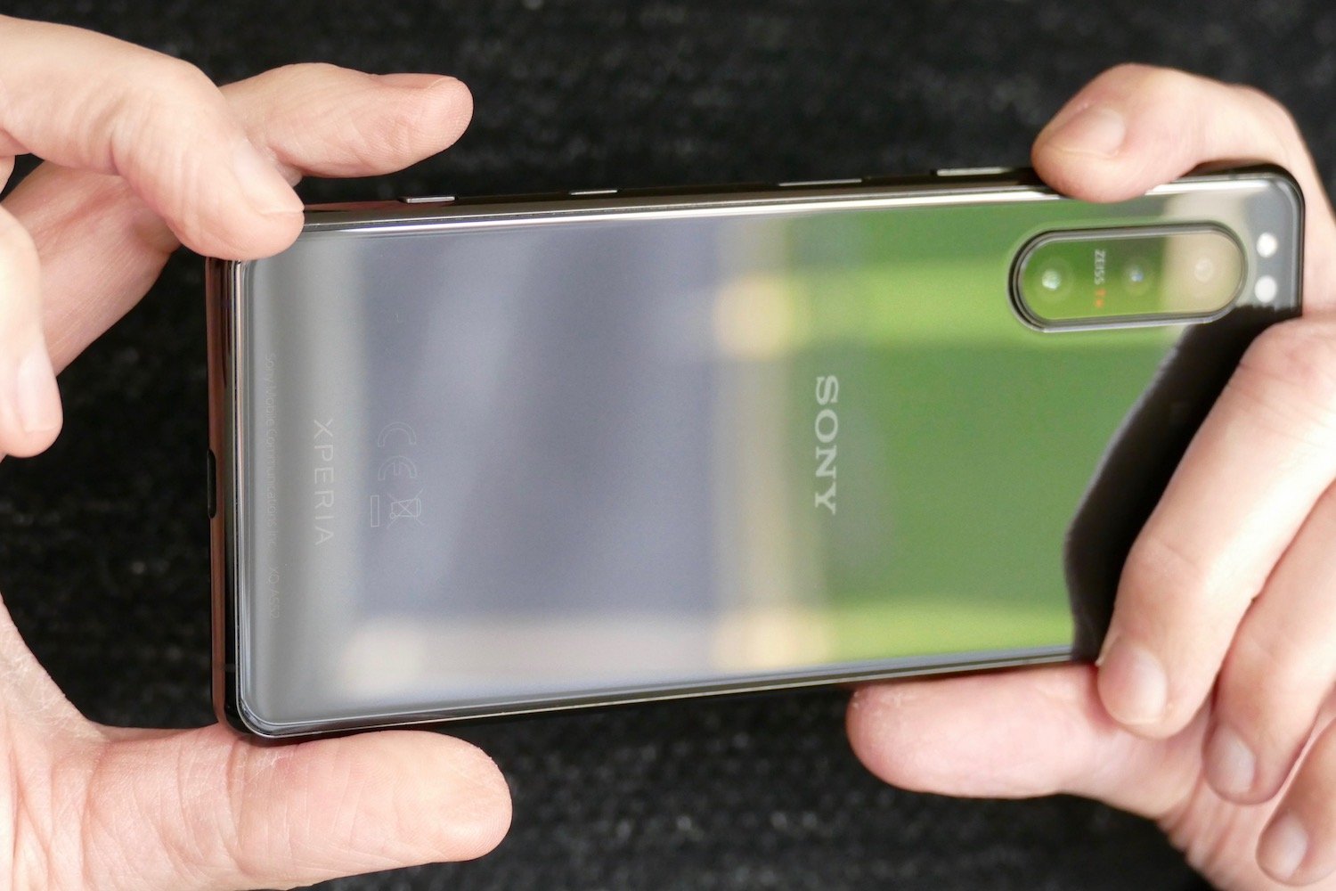 A person holds Sony Xperia 5 II.