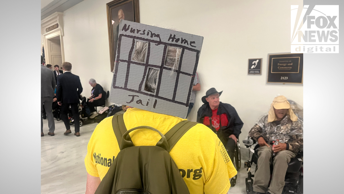 Closeup from the protester from behind at Capitol Hill Restrate on May 13, 2025