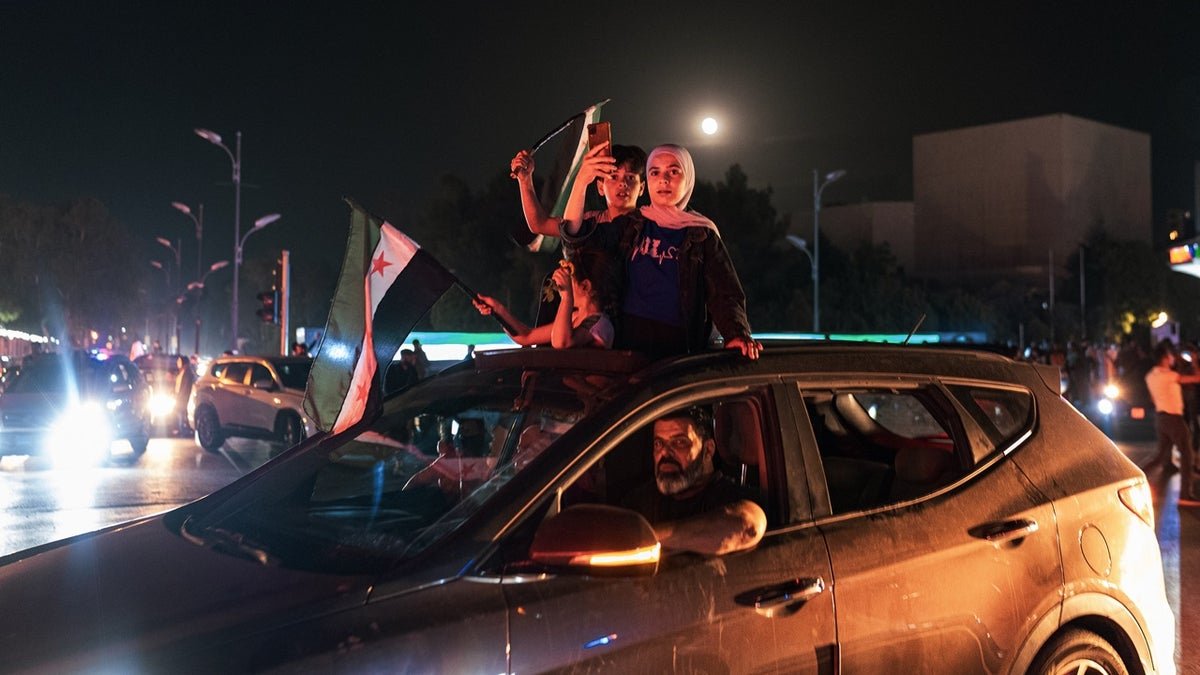 The Syrian people celebrate