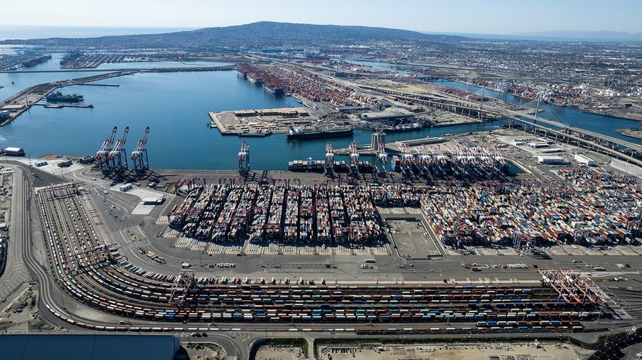 Los Angeles, California - October 16: The air view of containers waiting in the port of Long Beach is loaded on trains and trucks on October 16, 2021 in Long Beach, California. (Photo by Qian Wizhong/VCG via Getty Images)
