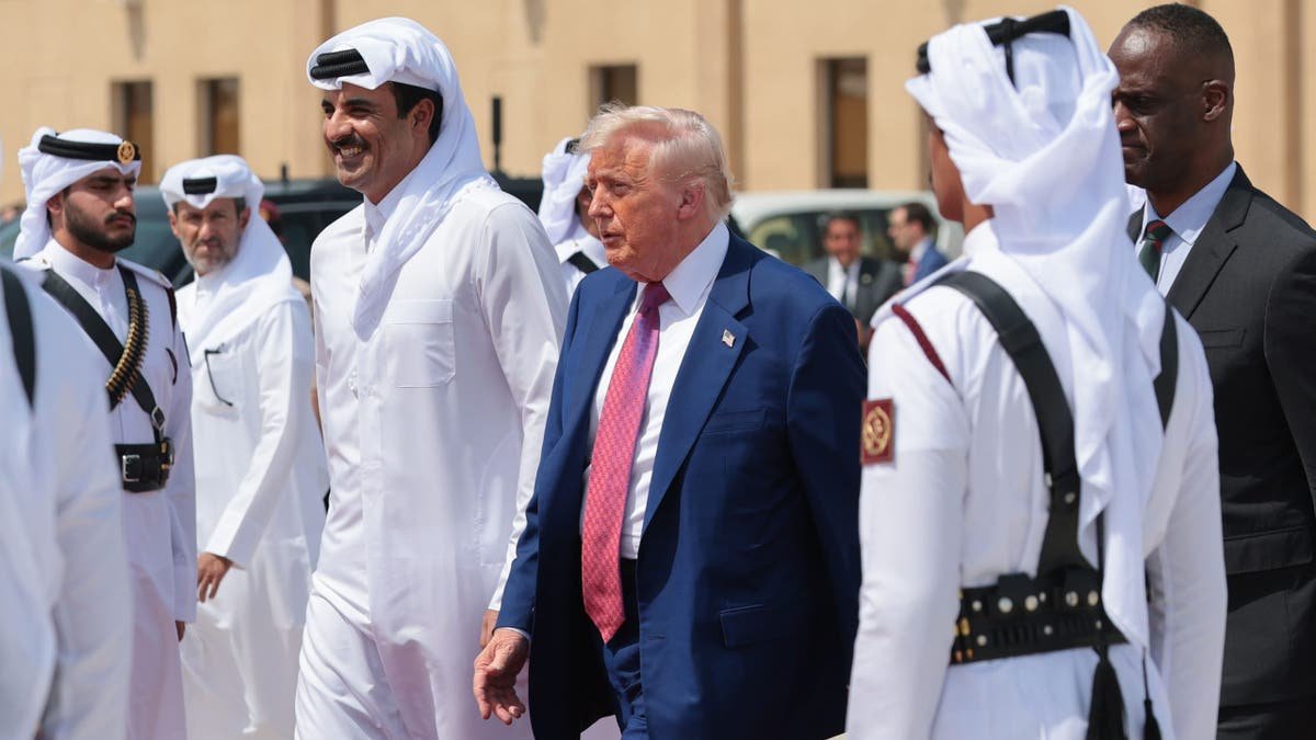 President Donald J Trump with the Emir of Qatar Tarim bin Hamad Al Thani is leaving the friendly air base of Abu Dhabi on May 15, 2025, in Doha, Qatar. (Win McNamee/Getty Images)