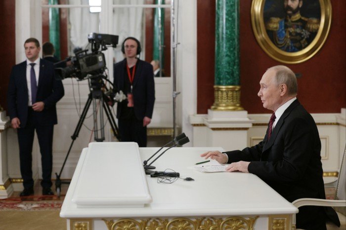 Vladimir Putin makes a statement of the media in the Kremlin