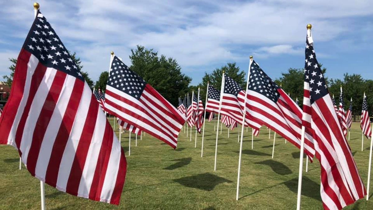 American flags appear in the field
