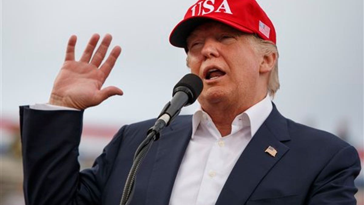 El Presidente Electo Donald Trump en unitin en mobile, alabama el 17 de diciembre del 2016. (AP Photo/Evan Vucci, File)