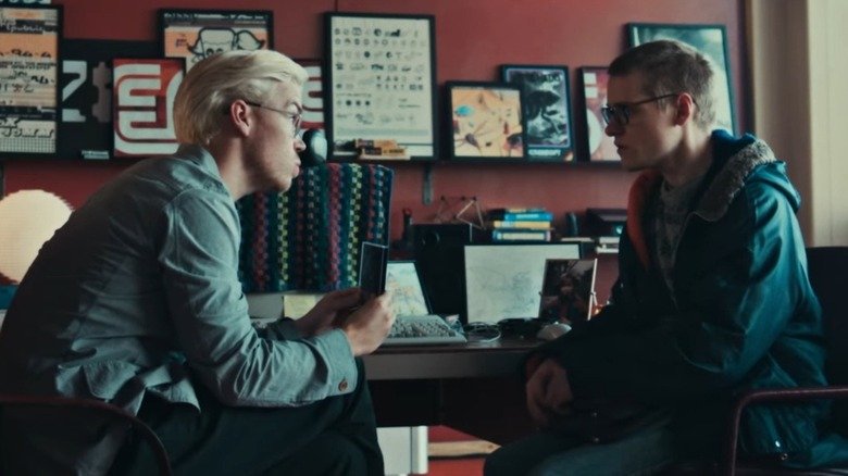 Will Polter in the role of Colin Reteman gives Louis Gharib in the role of Cameron Walker an interview in Black Mirror